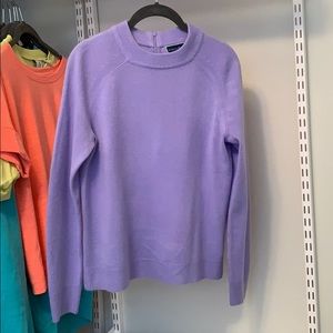 A vibrant, purplish, bluish sweater